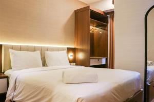 Strategic and Elegant 1BR The Mansion Kemayoran Apartment near JIEXPO By Travelio