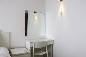 Fancy and Nice 1BR Apartment at H Residence By Travelio