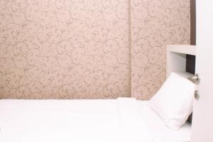 Nice and Strategic 2BR at Green Pramuka City Apartment By Travelio