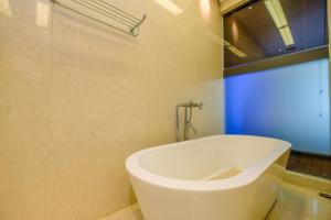 Homey Penthouse 3BR with Extra Room Kemang Village Apartment By Travelio