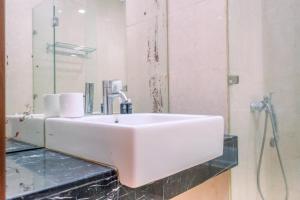 Homey Penthouse 3BR with Extra Room Kemang Village Apartment By Travelio