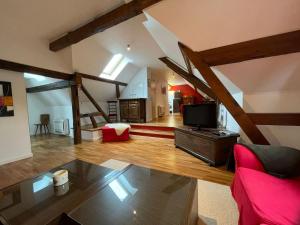 Appartements Gite Le Sarment : photos des chambres