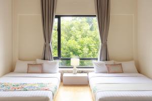 Junior Family Room by 233Poshtel - 4hvězdičkové hotely ve městě Lampang