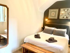 Appartements T2 lumineux - renove- - Centre historique Dinan- Parking - Terrasse : photos des chambres