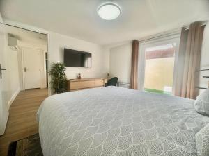 Appartements Petit cocon avec clim, centre-ville & proche gare : photos des chambres