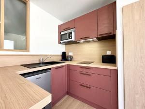 Appartements Sous les Palmiers - Neuf - Parking - Centre - Tele : photos des chambres