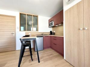 Appartements Sous les Palmiers - Neuf - Parking - Centre - Tele : photos des chambres
