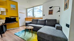 Appartements Suites Kerlarros Clim et Parking face Gare et Port : photos des chambres