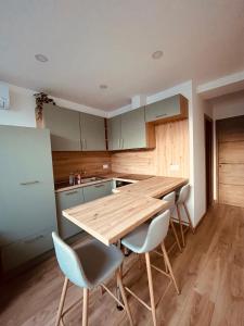 Appartements appartement terrasse Roof Top climatise : photos des chambres