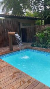 Flat com piscina e perto do mar Taipus