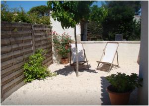 Appartements Charmant studio : photos des chambres