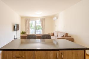 Danaos Seaside Suite 001 with Pool in Tourist Area