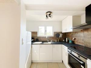 Appartements Somptueux appartement duplex proche RER : photos des chambres