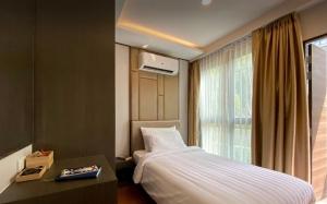 2 bdr Apartment in Mida Grande Surin Beach by CapitalPro