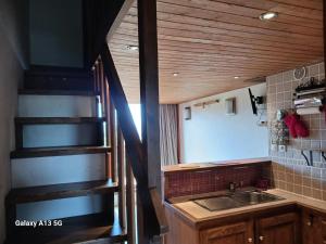 Résidence Aiguille Grive Bat I - Duplex pour 6 personnes à Arc 1800 dans le village de Charmettoger, skis aux pieds MAE-3621