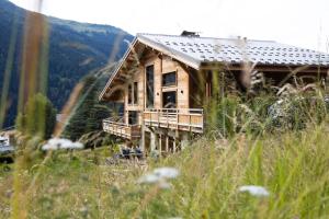 Chalets Magnifique chalet mitoyen - Jacuzzi - Cousinade II : photos des chambres