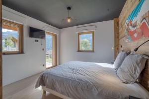 Chalets Magnifique chalet mitoyen - Jacuzzi - Cousinade II : photos des chambres