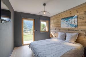 Chalets Magnifique chalet mitoyen - Jacuzzi - Cousinade II : photos des chambres