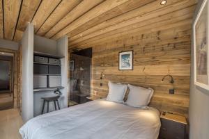Chalets Magnifique chalet mitoyen - Jacuzzi - Cousinade II : photos des chambres