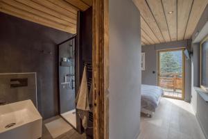 Chalets Magnifique chalet mitoyen - Jacuzzi - Cousinade II : photos des chambres