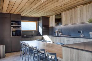 Chalets Magnifique chalet mitoyen - Jacuzzi - Cousinade II : photos des chambres