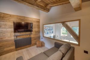 Chalets Magnifique chalet mitoyen - Jacuzzi - Cousinade II : photos des chambres