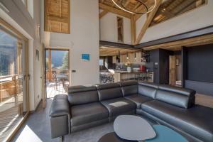 Chalets Magnifique chalet mitoyen - Jacuzzi - Cousinade II : photos des chambres