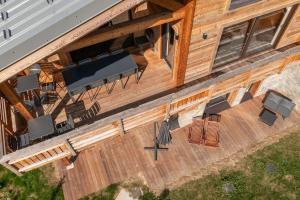Chalets Magnifique chalet mitoyen - Jacuzzi - Cousinade II : photos des chambres