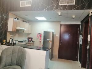 Flat in City Tower one bedroom and hall and 2bath