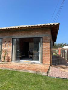 Casa Enjoy dentro do Condomínio Lagoa Cortada em Balneário Gaivotas