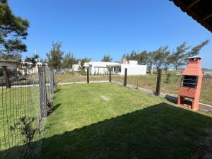 Casa Enjoy dentro do Condomínio Lagoa Cortada em Balneário Gaivotas