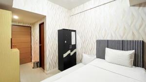 Good Place Studio Apartment at Vida View Makassar By Travelio