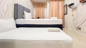 Good Place Studio Apartment at Vida View Makassar By Travelio