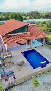 Casa com piscina no Condomínio Oásis do Mar - Lucena PB - Lucena
