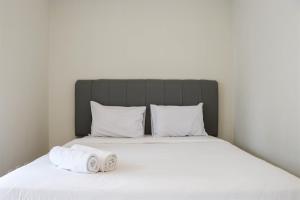 Homey and Modern 2BR at The Mansion Kemayoran Apartment By Travelio