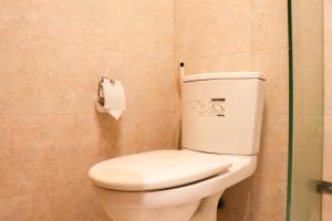 Homey and Modern 2BR at The Mansion Kemayoran Apartment By Travelio