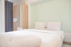 Cozy and Homey Studio Room Tokyo Riverside PIK 2 Apartment By Travelio