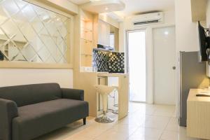 Comfort and Modern 2BR at Bassura City Apartment By Travelio