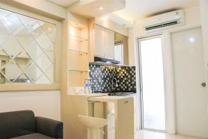 Comfort and Modern 2BR at Bassura City Apartment By Travelio