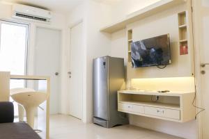 Comfort and Modern 2BR at Bassura City Apartment By Travelio