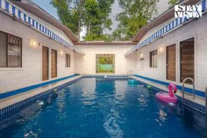 Sundream Palms by VEO - Part of StayVista with Pool, Lawn, BBQ - Alibag