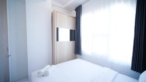 Simple and Comfortable Living 1BR at The City Square Apartment By Travelio