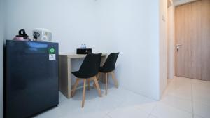Simple and Comfortable Living 1BR at The City Square Apartment By Travelio