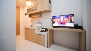 Simple and Comfortable Living 1BR at The City Square Apartment By Travelio