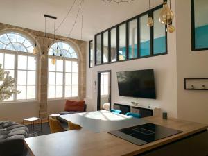 Les Fabuleux appartements du Coeur de ville - Place Victor Hugo : photos des chambres