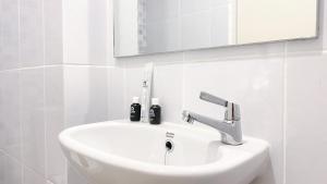 Homey and Well Furnished Studio Tokyo Riverside PIK 2 Apartment By Travelio