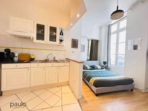 Appartements Studio chaleureux : photos des chambres