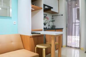 Best Choice and Homey 2BR Bassura City Apartment By Travelio