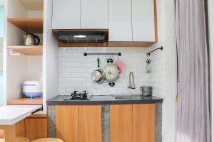 Best Choice and Homey 2BR Bassura City Apartment By Travelio