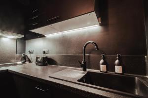 Appartements Suite Intemporelle : photos des chambres